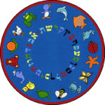 A round blue educational kids rug with the Hebrew alphabet and animals around the edge.