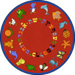 A round red educational kids rug with the Hebrew alphabet and animals around the edge.