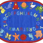 A blue oval kids rug with animals and alphabet around the edge