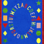 A blue educational kids rug with the alphabet and shapes