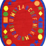 An oval red educational kids rug with the alphabet and shapes