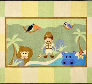 A baby rug with a whimsical explorer boy, lion, hippo and birds.