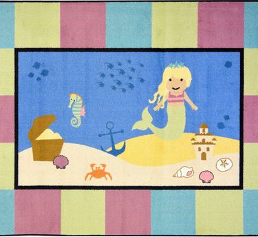 A baby rug with a whimsical mermaid, seahorse and sandcastle.