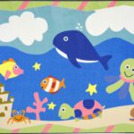 a colorful baby rug with sea animals