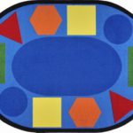 An oval classroom seating rug with fun shapes in different colors around the edge of the rug.