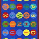 A fun educational kids rug with alphabet inside dots.