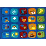A classroom seating rug with fun blocks in different colors with images inside.