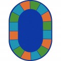 An oval classroom rug with individual blue, green, and orange seating squares around the edge.