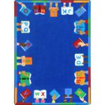 A blue childrens rug with books and the alphabet around the edge