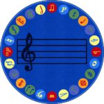 A round blue music rug with music notes around the edge and music bar in the center